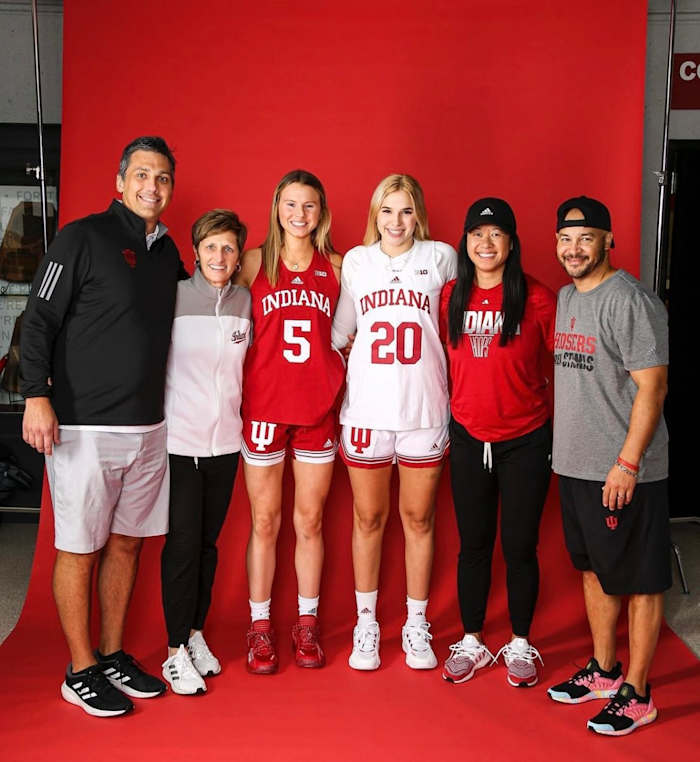 Lenée Beaumont poses with Indiana associate coach Rhet Wierzba, coach Teri Moren, assistant coach Linda Sayavongchanh and associate head coach Glenn Box.